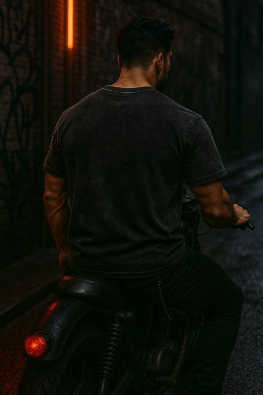 Men acid washed oversized t shirt men in black worn by man sitting on a motorcycle in dark alley