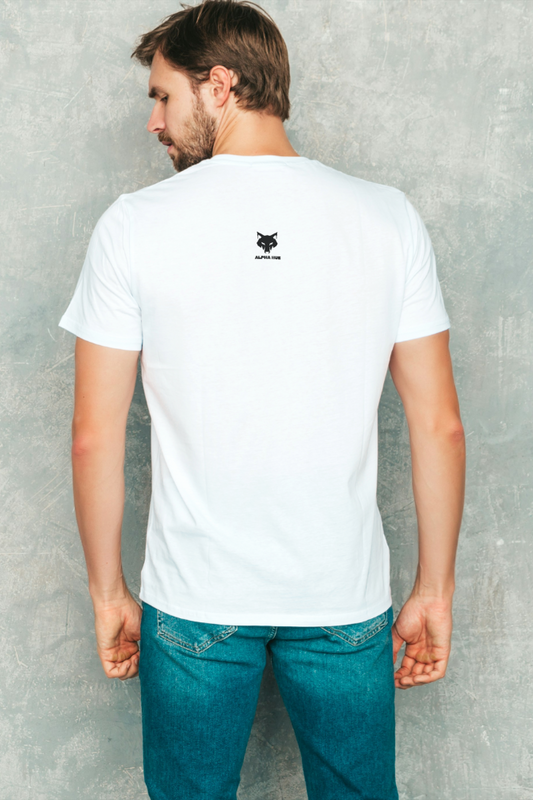 Back view of man wearing white alpha hue Supima cotton t-shirt for men paired with blue jeans