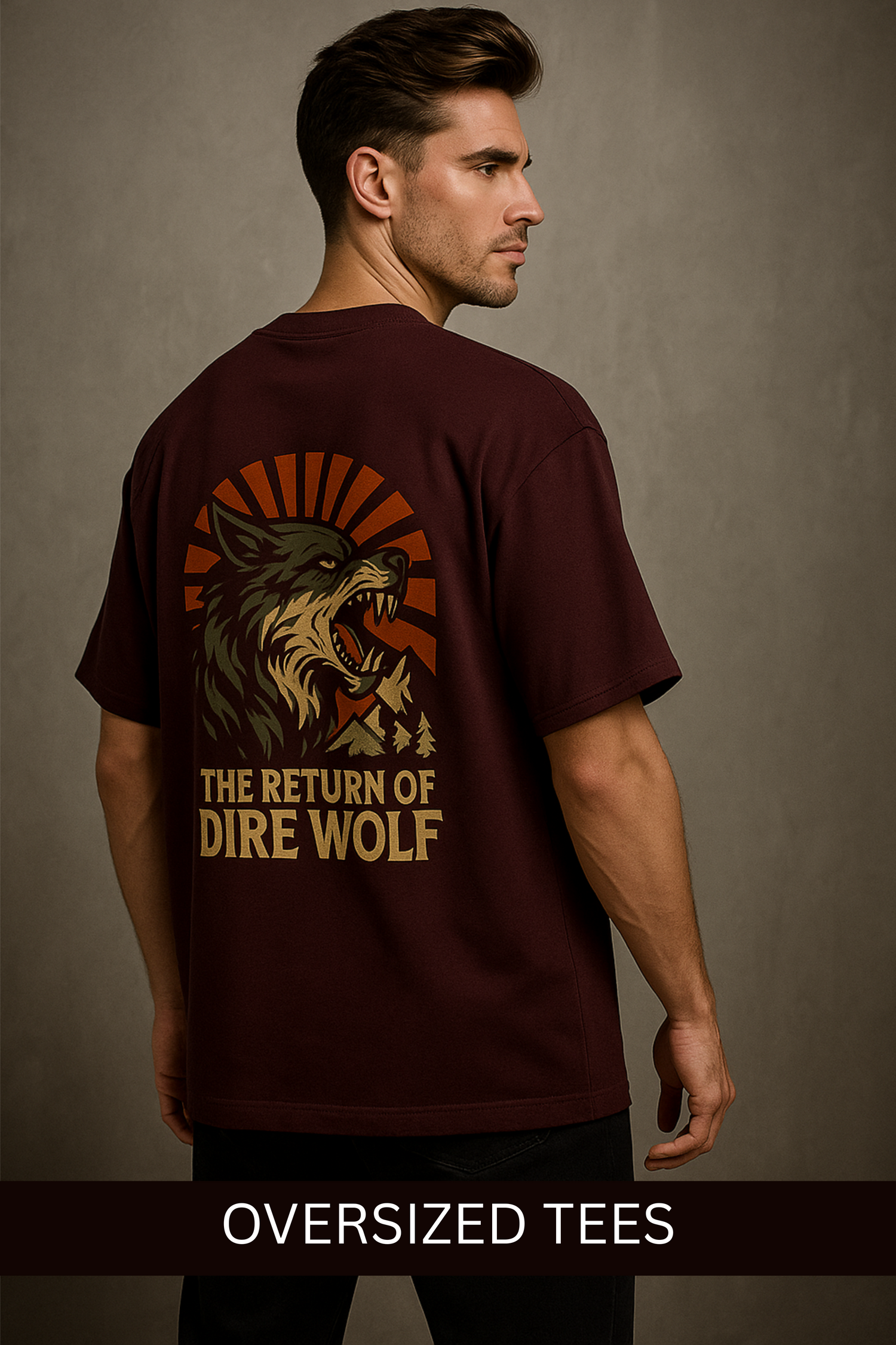 Man wearing a men's oversized t-shirts with a bold graphic of a dire wolf on the back