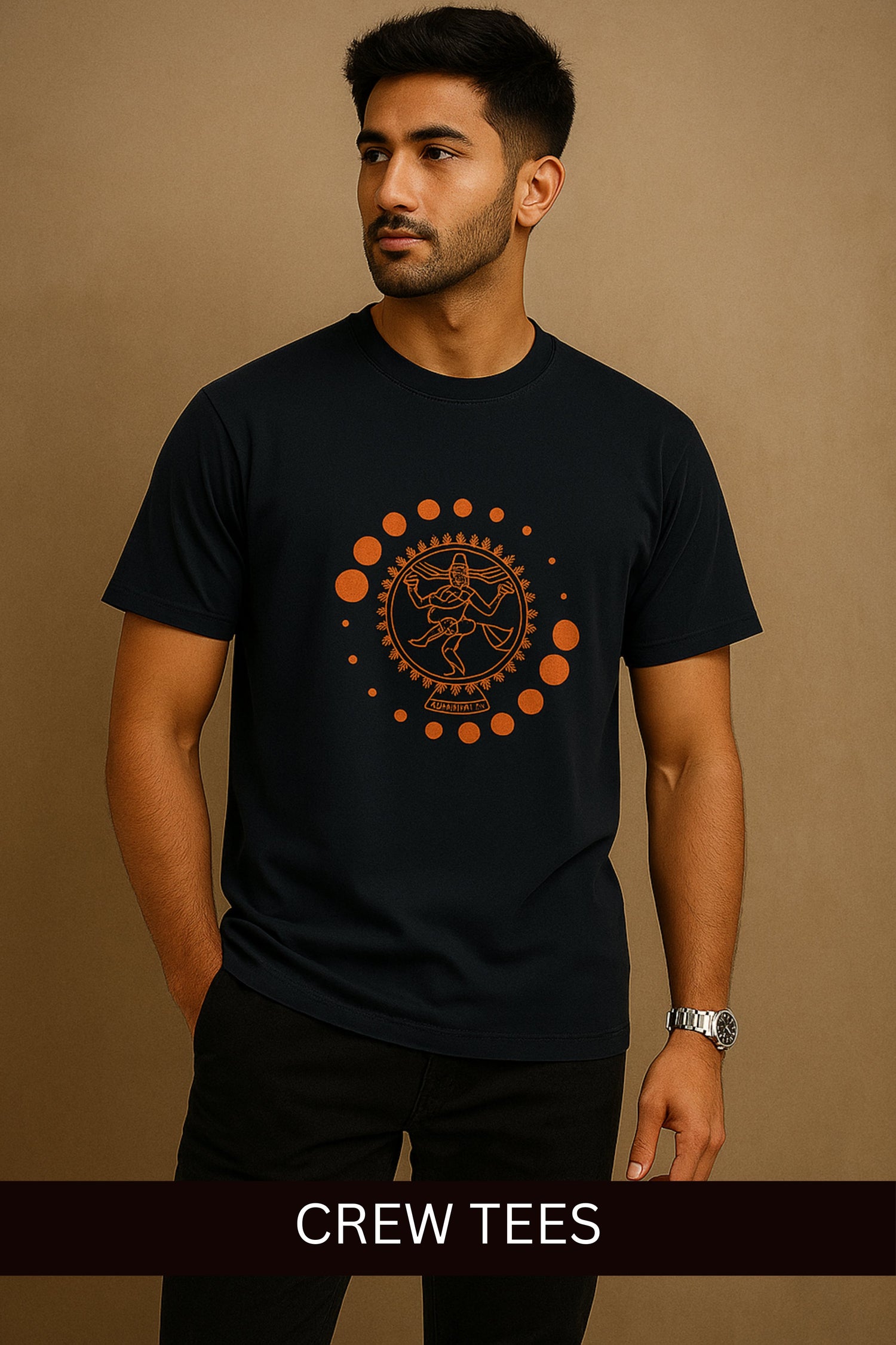 Male model wearing men's classic crew t-shirts black with orange graphic print standing against brown background