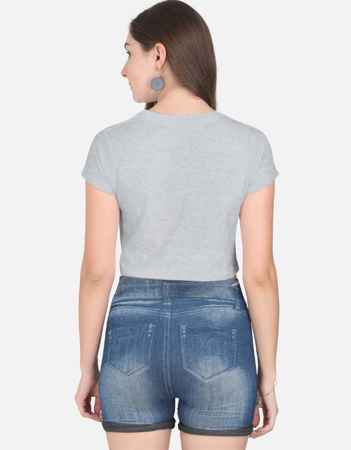 Alpha hue women's crop top in light gray worn with denim shorts showing back view