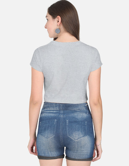 Alpha hue women's crop top in light gray worn with denim shorts showing back view