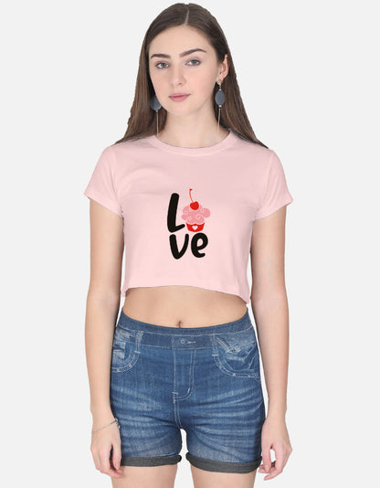 Alpha hue pink women's crop top with love graphic and cherry design paired with denim shorts