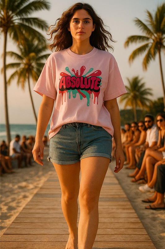 ALPHA HUE women oversized t-shirt in pink with colorful graphic print, styled with denim shorts on beach