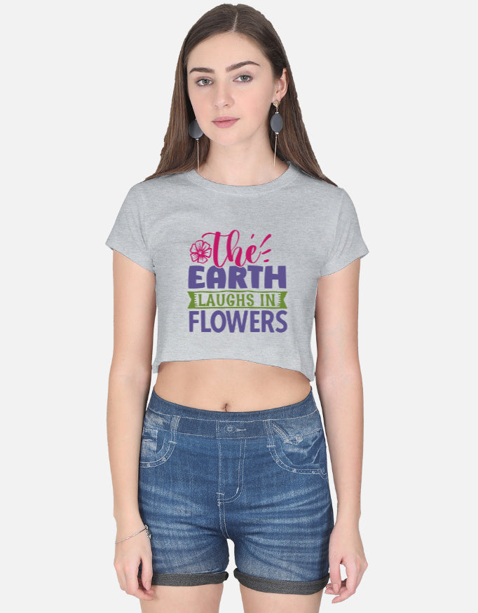 Alpha hue women's black crop top styled with blue denim shorts on model