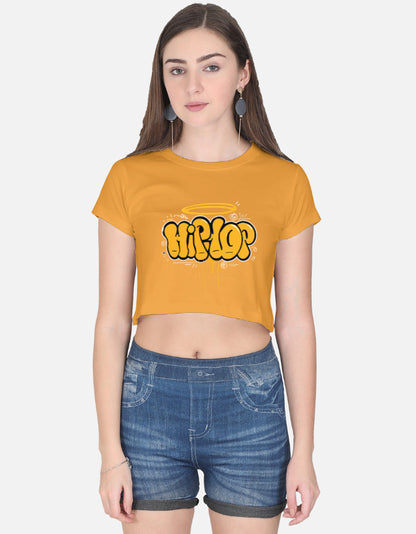 Yellow alpha hue women's graphic crop top with hip hop design worn with denim shorts
