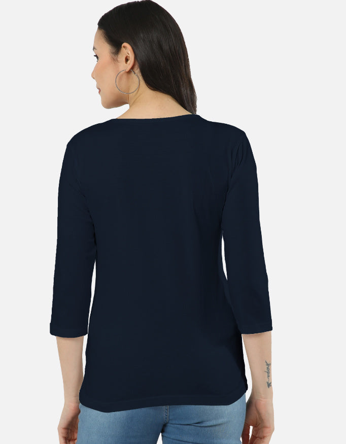 Back view of woman wearing navy ALPHA HUE women's long sleeve tee with 3 quarter sleeves
