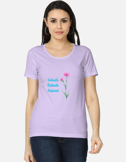 Alpha hue women wearing lavender t-shirt with flower graphic and text design