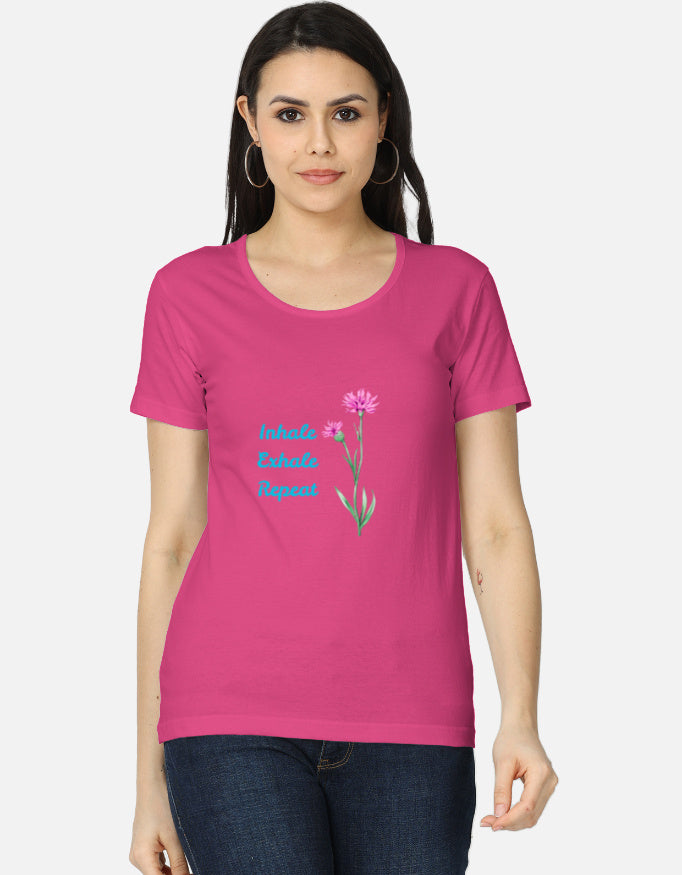 Pink women's classic t-shirt by alpha hue with flower graphic and inhale exhale repeat text